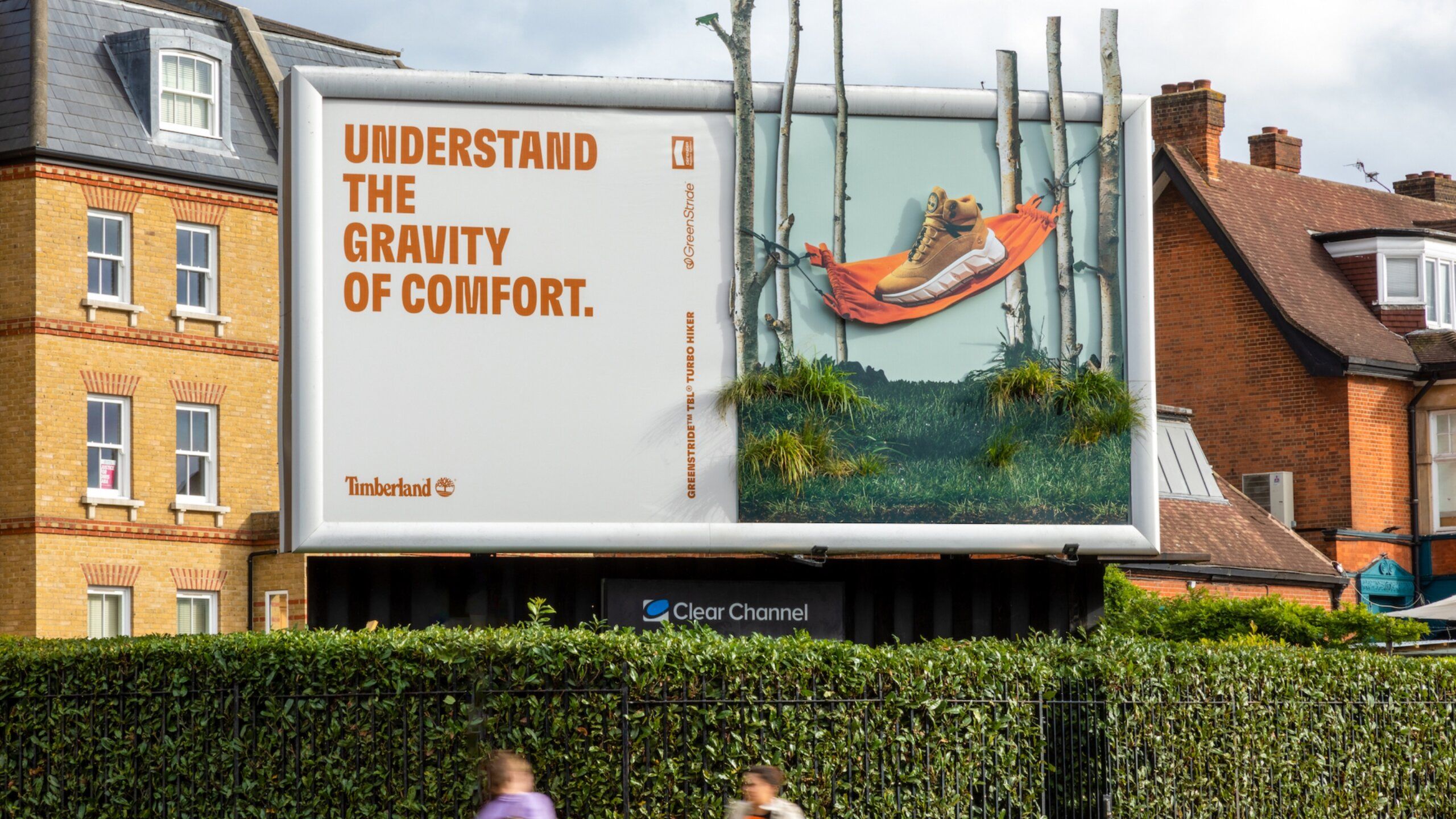 Billboard with Timberland boot in hammock. Text reads Understand the gravity of comfort.