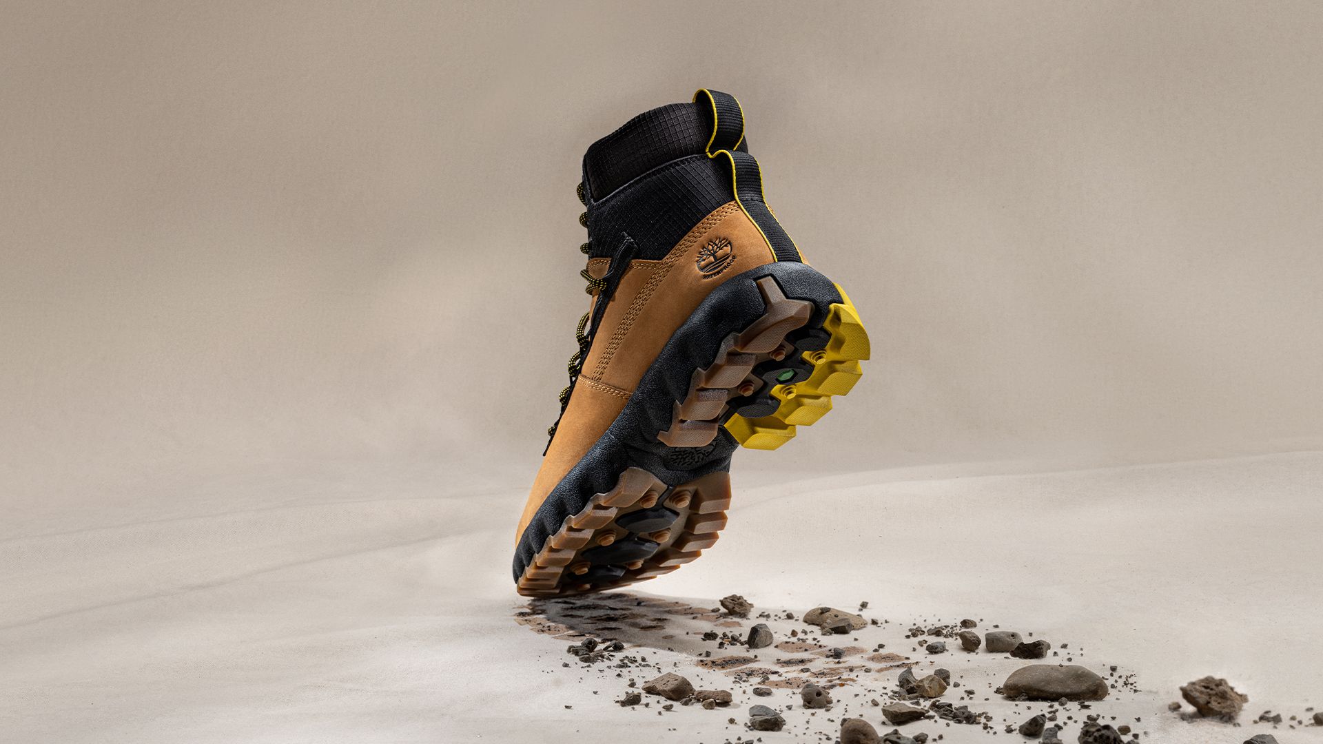 Timberland Greenstride boot showing bottom tread and trail of dirt behind it