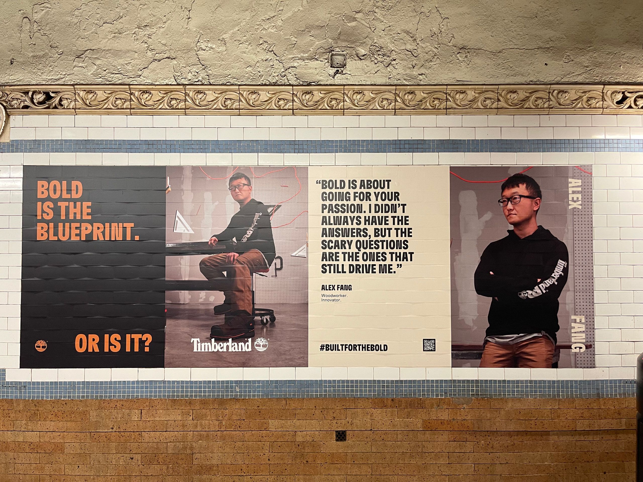 Bold is the Blueprint poster on subway wall