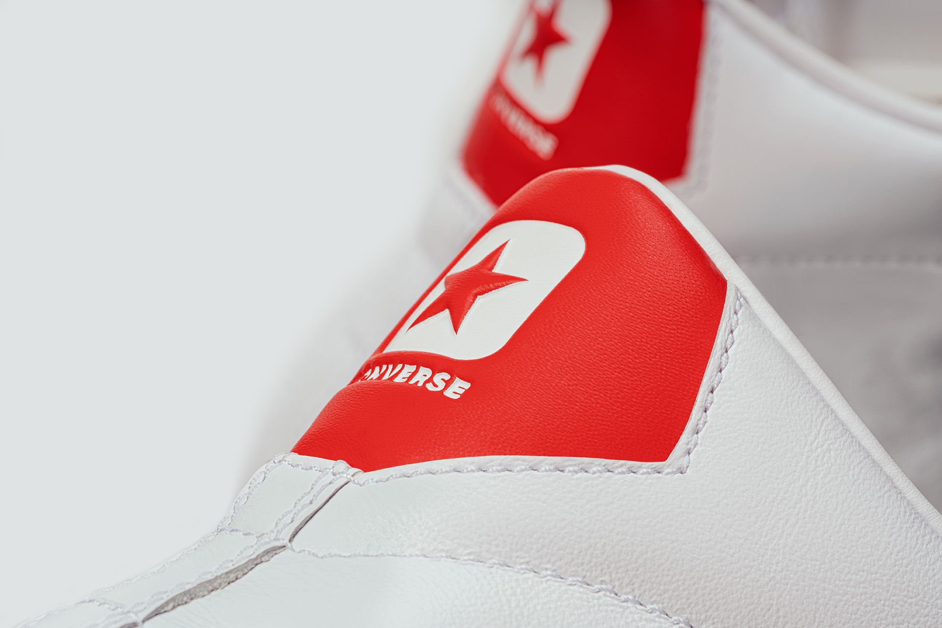 close up of heel converse pro leather shoe showing red star logo