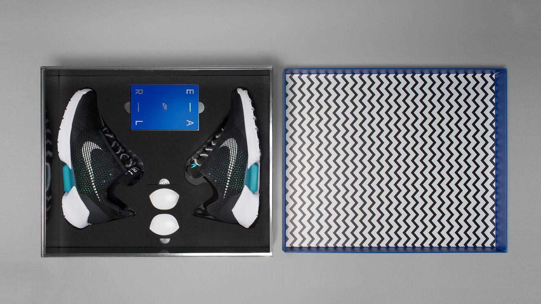 Top view of Nike Hyper Adapt sneaker packaging opened.