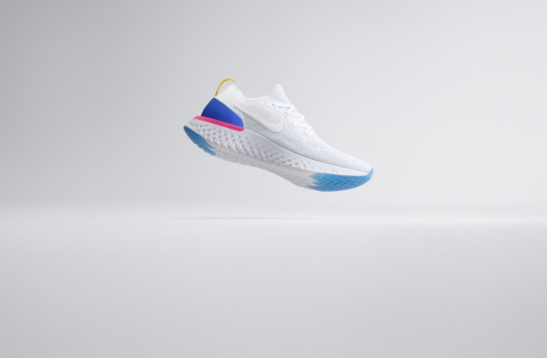 Nike React sneaker in white colorway against white background